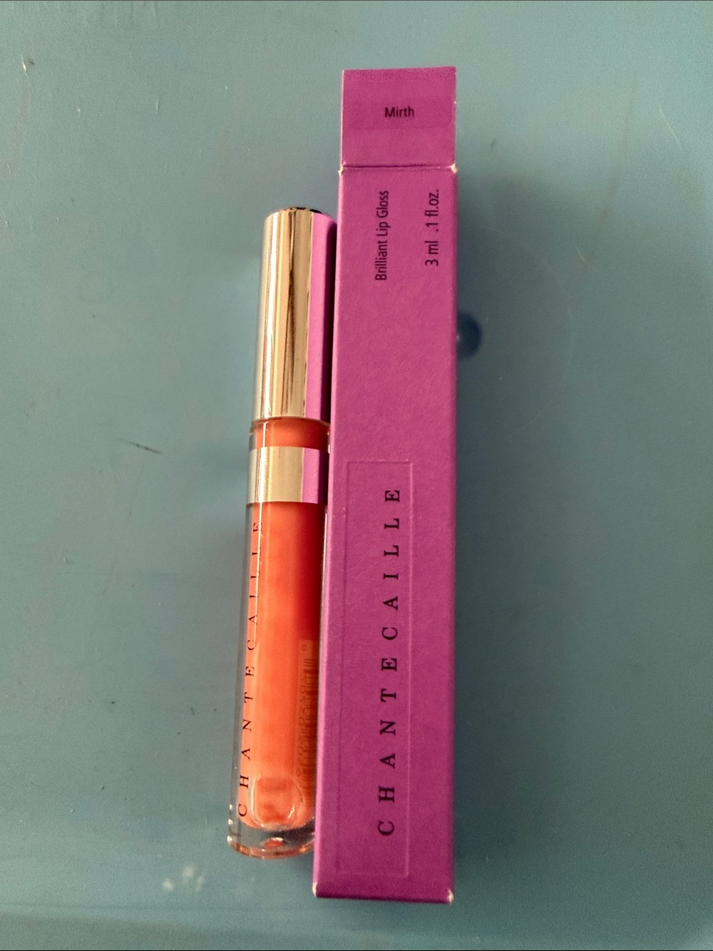 Chantecaille Brilliant Lip Gloss in Coral-Orange
